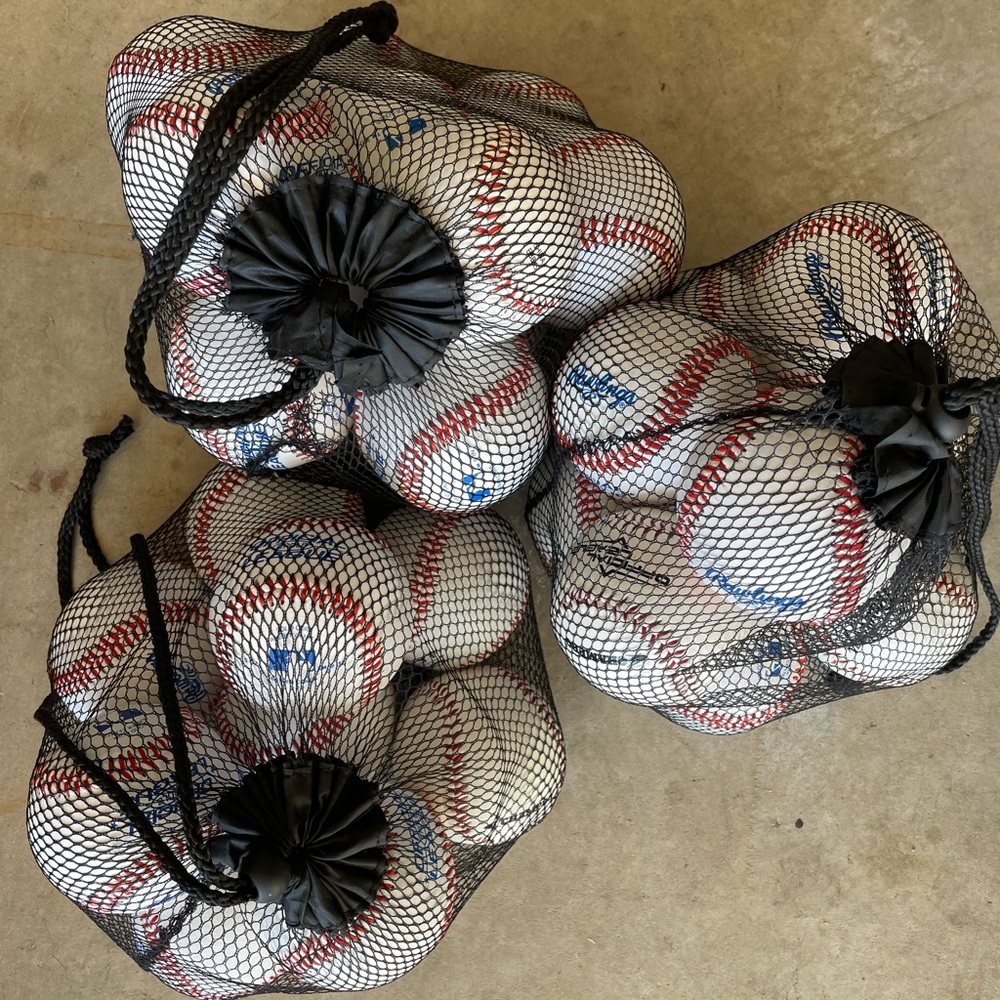 Around 30 brand new baseballs